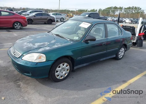 1999 Honda Civic Lx z USA, uszkodzony, nr VIN 2HGEJ6672XH548762
